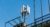 mobile-network-cell-tower-in-city-4g-5g-communicat-RAY99VW